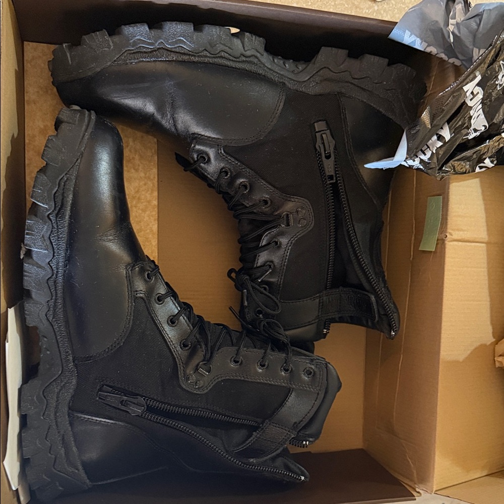 Rocky alpha force Lace-up design with side zippers. Size 14 W.